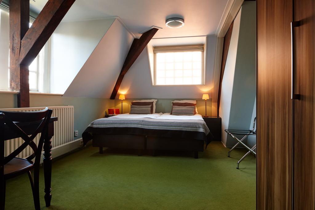Hotel Aan De Dam Middelburg Bagian luar foto