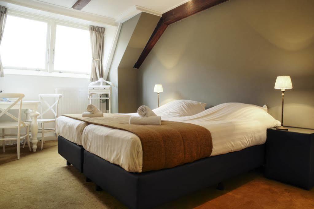 Hotel Aan De Dam Middelburg Bagian luar foto
