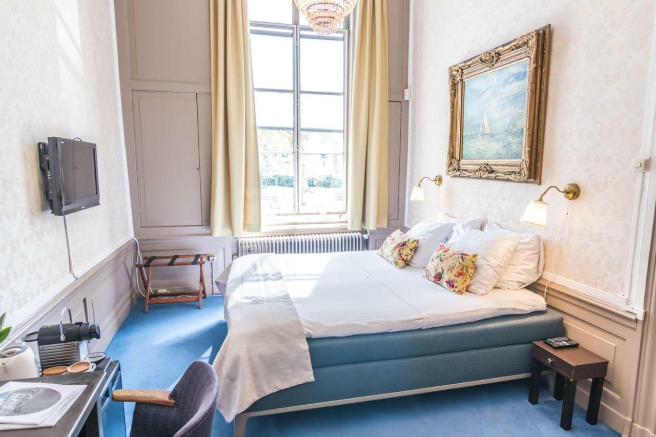 Hotel Aan De Dam Middelburg Bagian luar foto